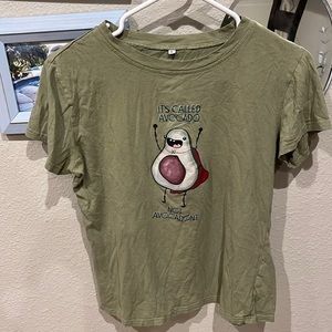 Short sleeve green t shirt, with cute avocado graphic.